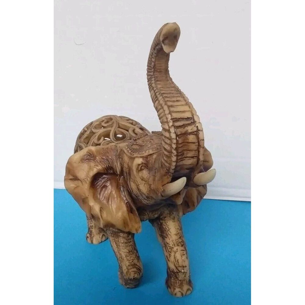 Decorative Carved Elephant Figurine with Intricate Filigree Design Uplifted Trun